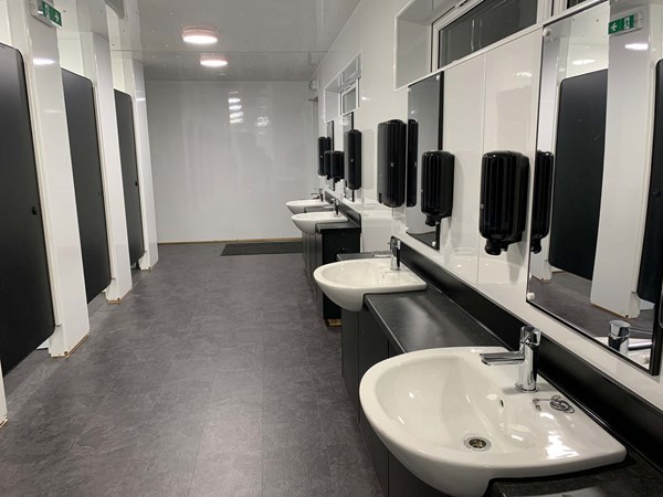 Toilet cubicles and socially distanced sinks