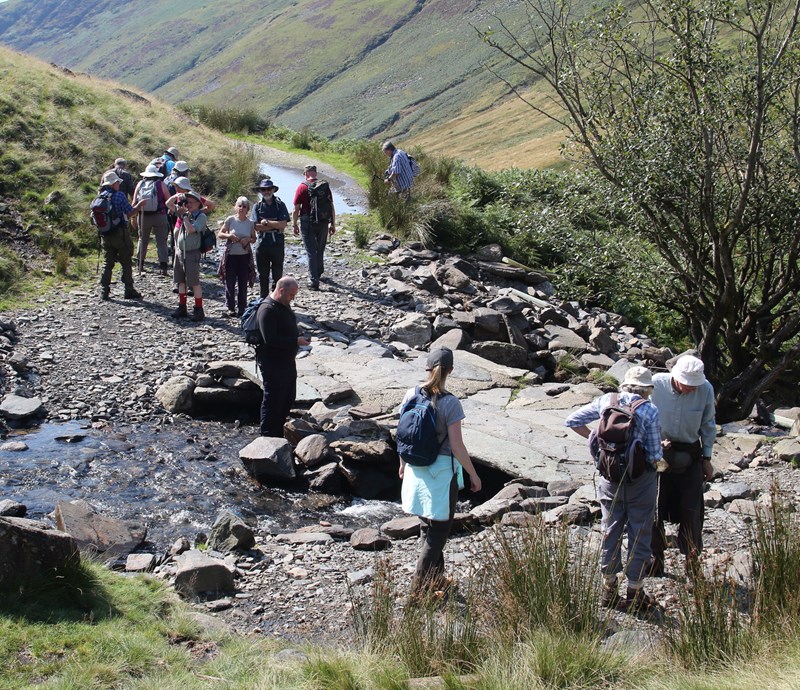 Examining spotted slates at Roughten Gill