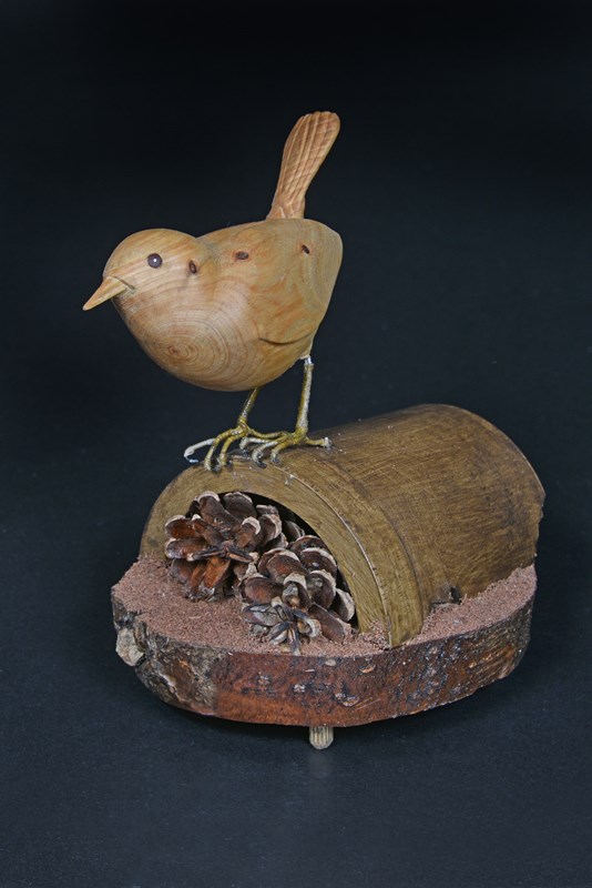 Wren on a plant pot, not full size by John Hodkin