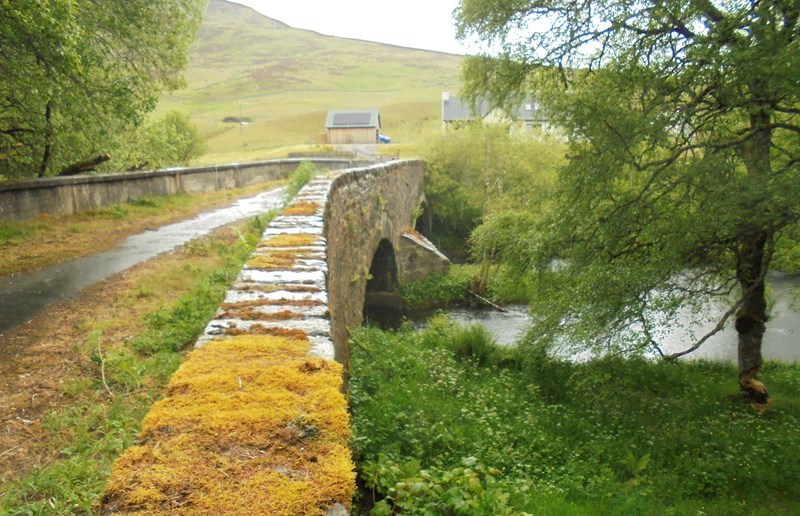 Moss covered old road bridge at Amulree