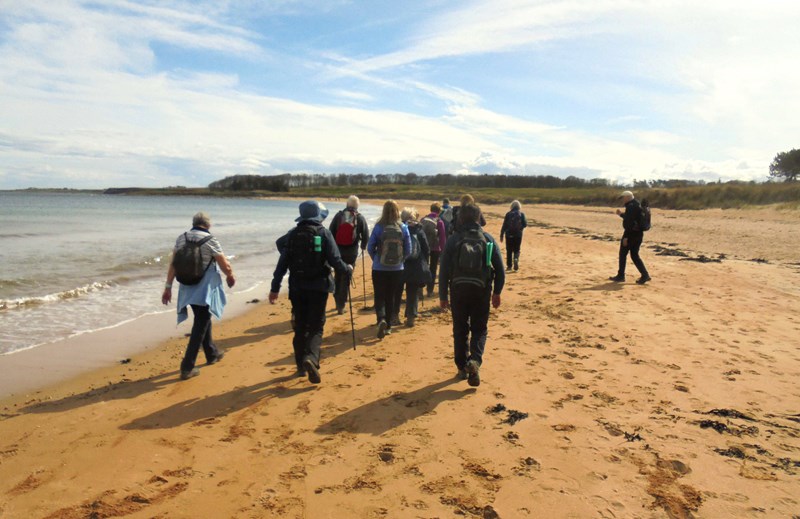 Walking along Kingsbarns beach