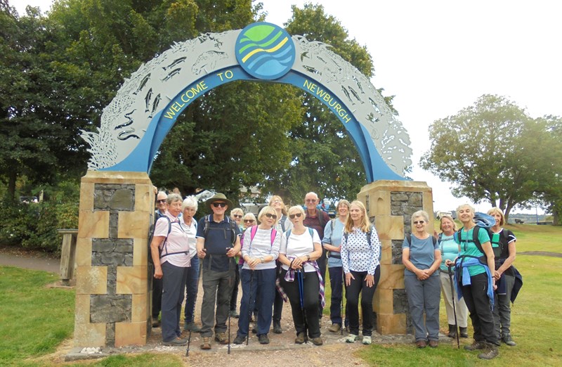 Under the arch at the start of the Coastal Path