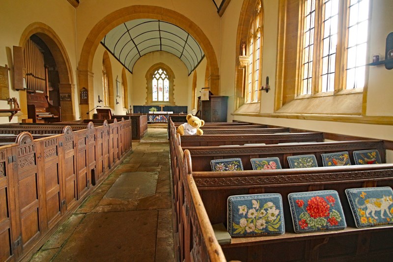 Big Ted clambering in box pews