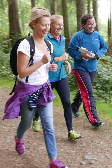 Three participants on an orienteering event in Culbokie wood