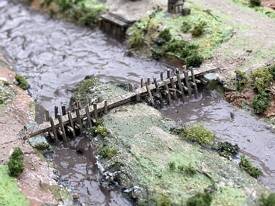 The 12th century timber trestle bridge,  spanning across the southern part of the bylet island.