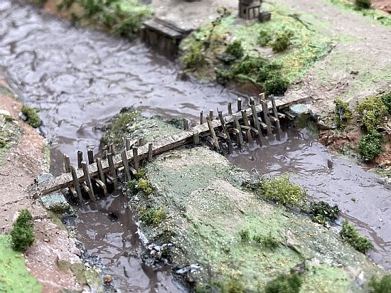 The 12th century timber trestle bridge, spanning across the southern part of the bylet island.