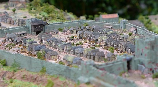 Castle outer bailey looking north. Rear of Main Gate with attached timbered building to the top left