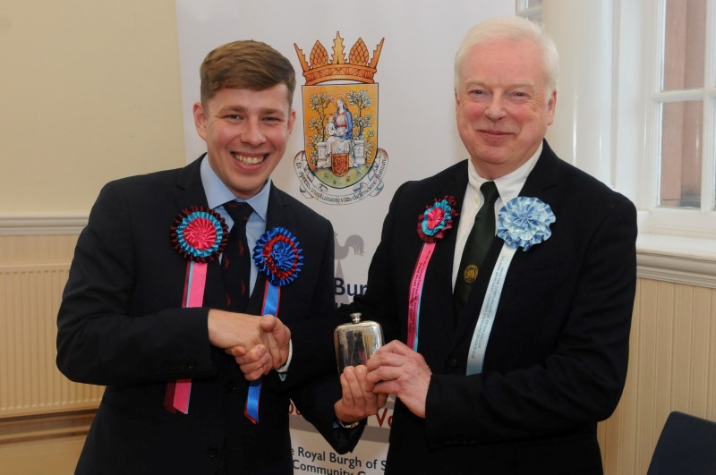 Royal Burgh Standard Bearer Mathew Stanners receives traditional gift - see News