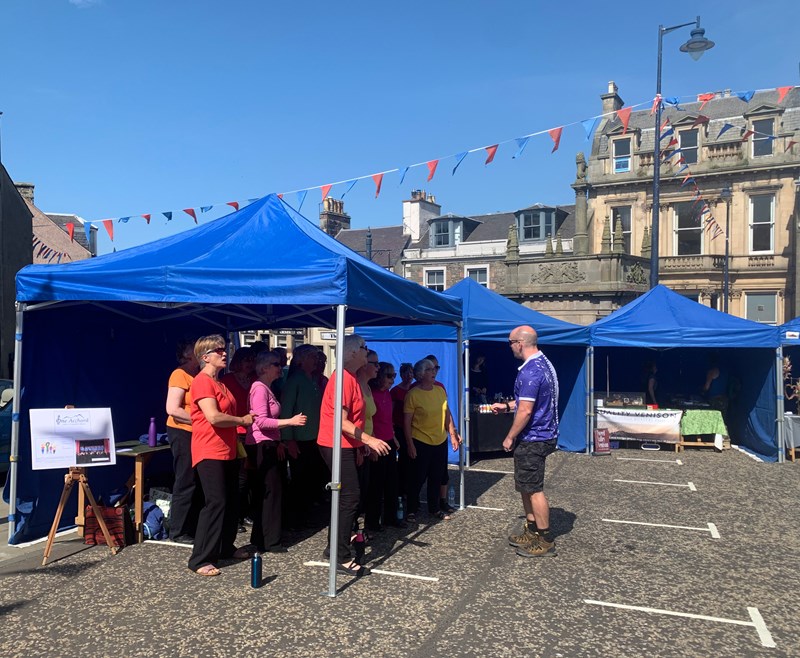 One Acchord vocal group at the Farmers' Market, June 3 