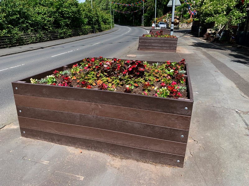 The Toll Planters with new flowers