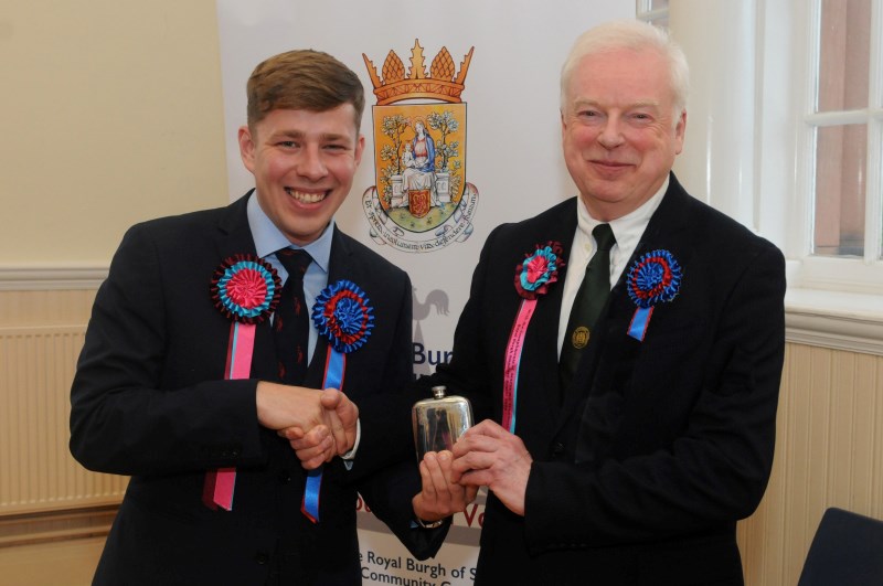 Royal Burgh Standard Bearer Mathew Stanners receives traditional gift   see News