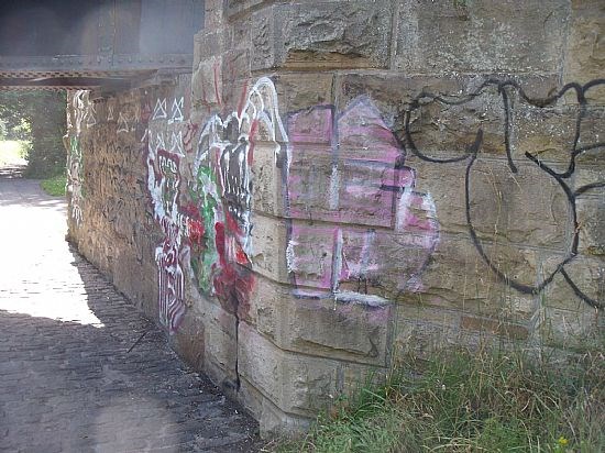 Wall of rampart (canal side) to footbridge over canal
