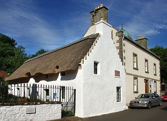 Whitewashed, thatched cottage; Hugh Miller's Birthplace Cottage in Cromarty, Scotland