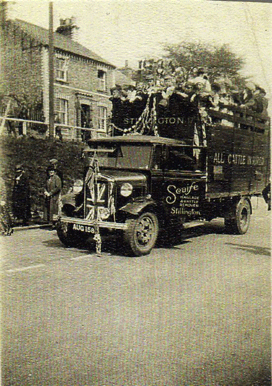 Parade travelling up High Street.