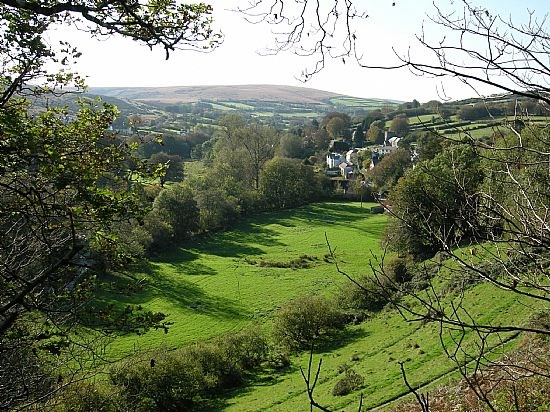 Withypool nestling in the valley, looking towards the moor of Withypool Common.