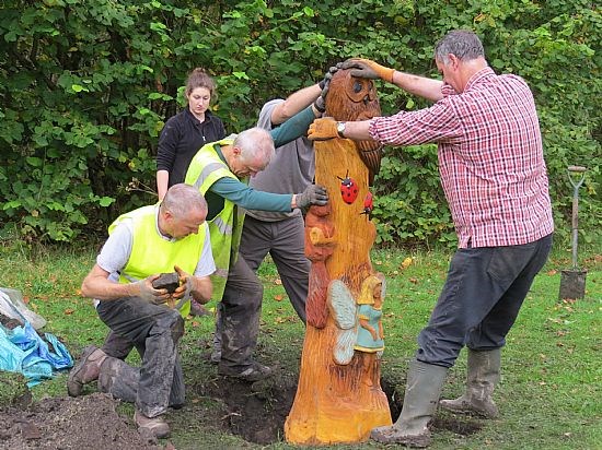 Erecting a Wood Carving