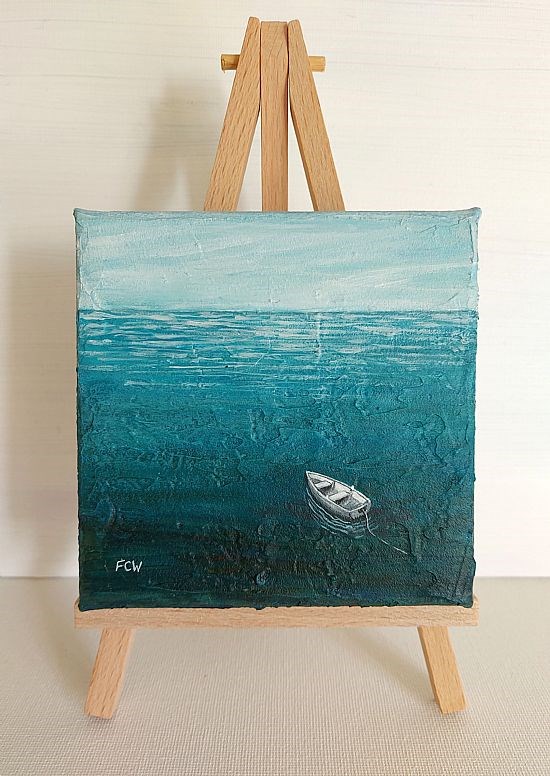 Small White Boat on easel stand