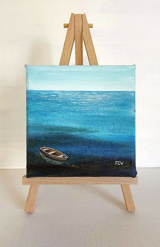 Small Wooden Boat on easel stand