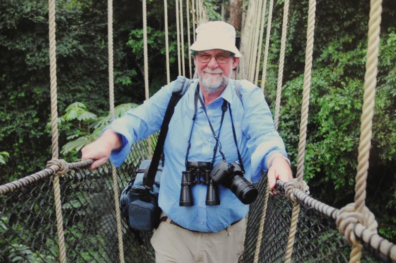 Michael on the canopy walkway high above the Kakum National Park rainforest in Ghana, 2015.