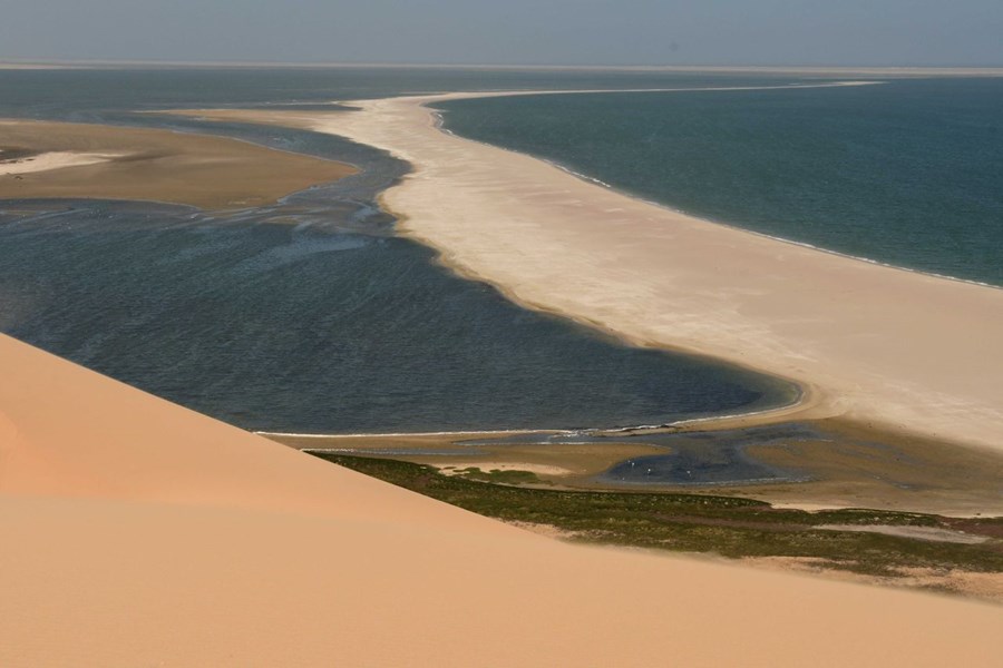 A high level view over Sandwich Harbour, long since buried by the encroaching sand.