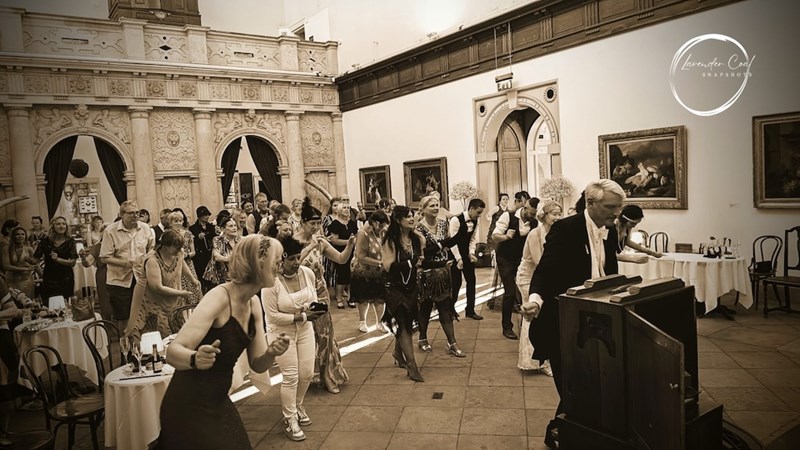 People enjoying celebrating 100th anniversary