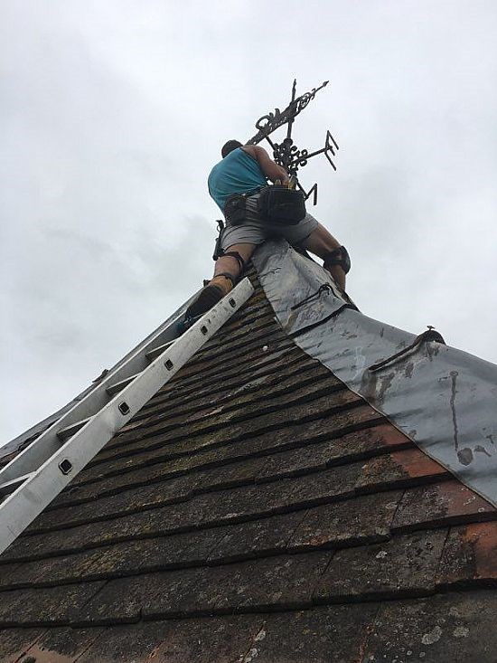 The weathervane is removed