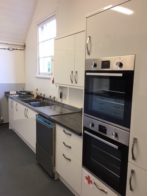 New double oven with full size fridge to the right