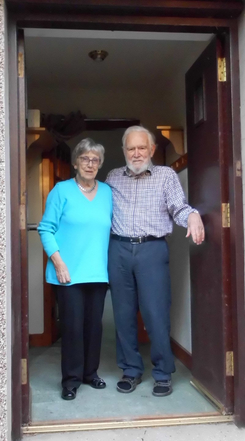 A couple in a doorway