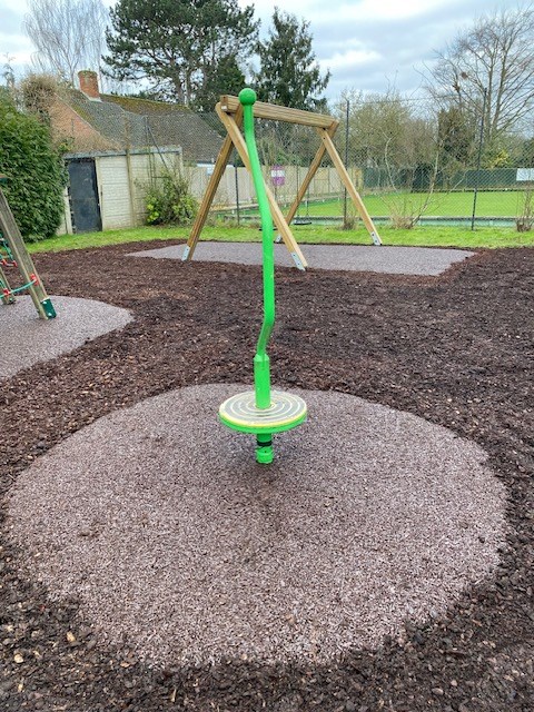 New rubber surfacing under spinner