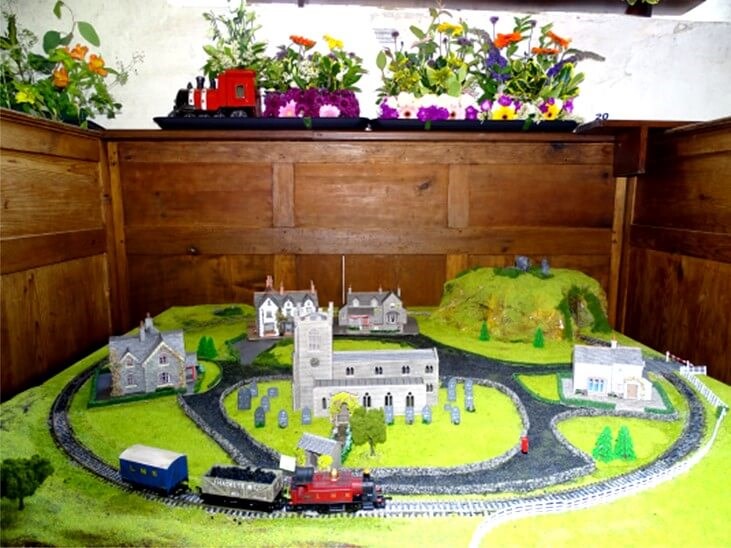 Train set with flowers in the background