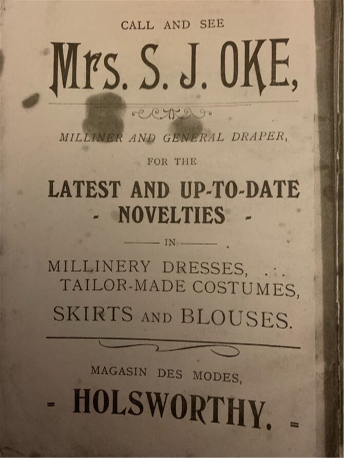 Page from a book advertising Mrs S J Oke latest and up-to-date novelties, millinery dresses, tailor made costumes, skirts and blouses. Holsworthy.