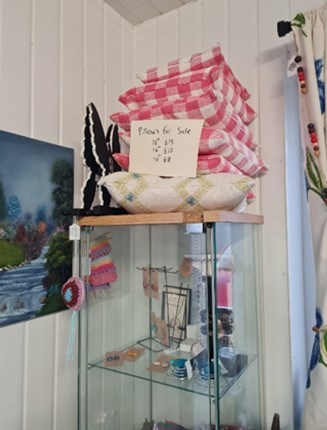 Display of cushions and other items