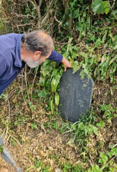 Man looking at the Boundary Stone