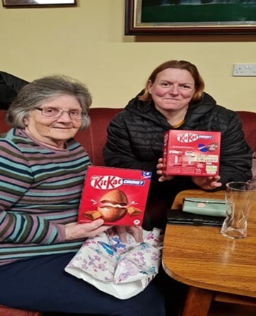 Raffle winners with their chocolate prizes