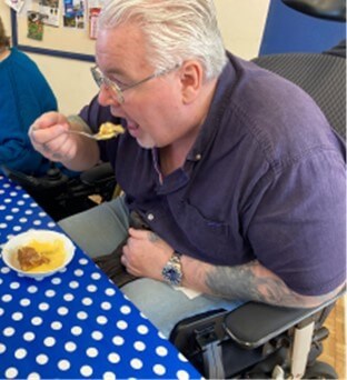 Person sitting and eating