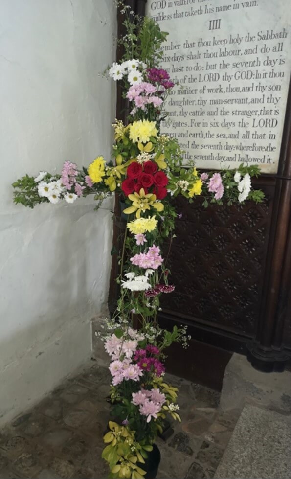 Cross decorated with flowers