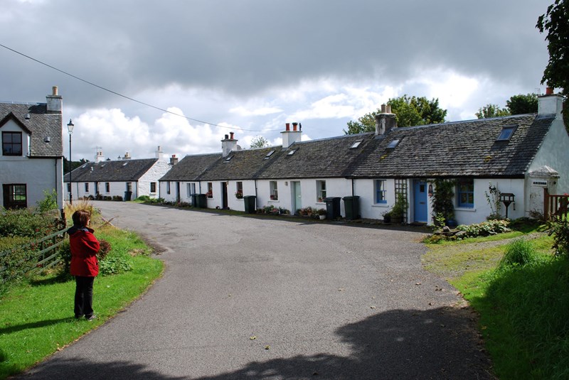 White cottages on Luing on a bright sunny day