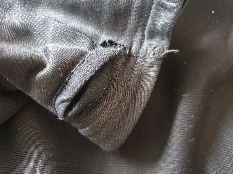 Rab PS Zip Top - thumb loop damage