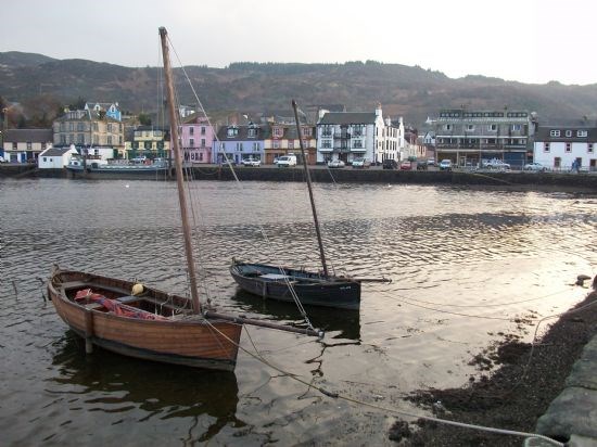 Two historic craft moored opposite the Victoria Hotel